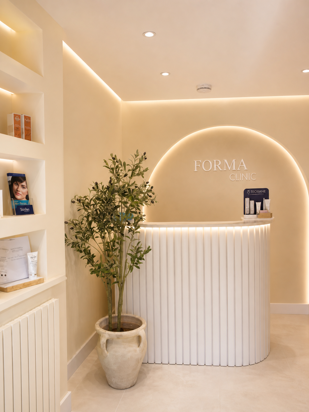 Warm, softly lit reception at Forma Clinic